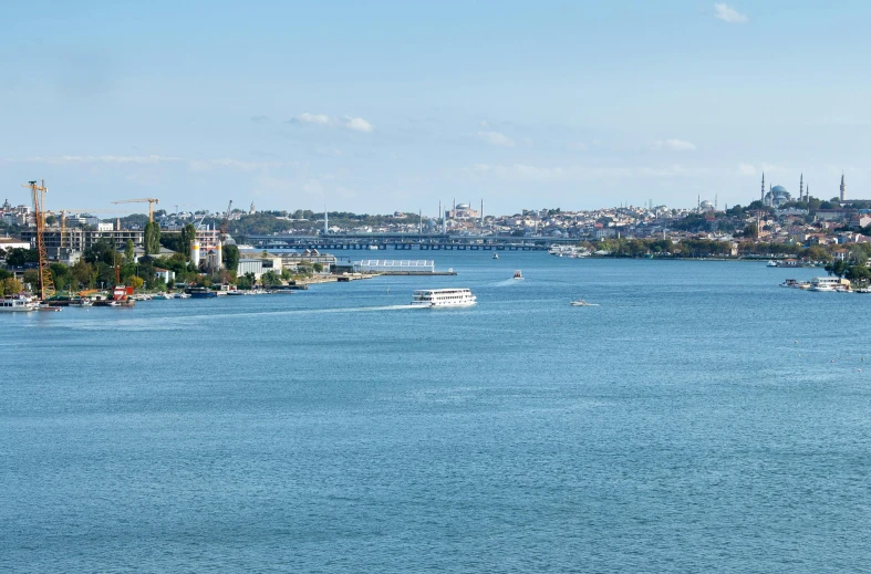 the view over the water and boats out on the river