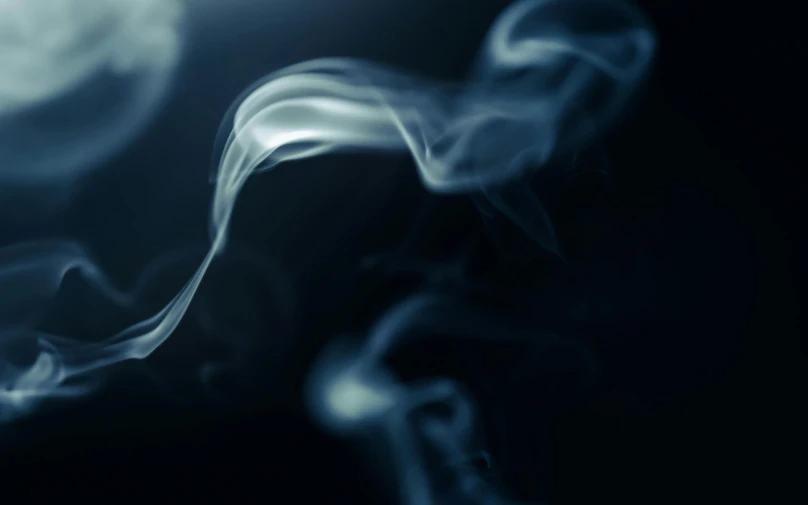 abstract smoke background in deep blue hues