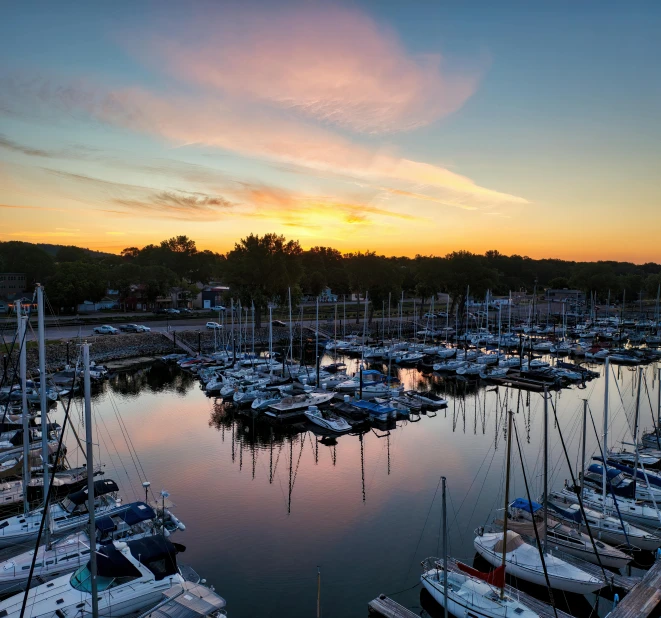 sunset with a lot of boats on the water