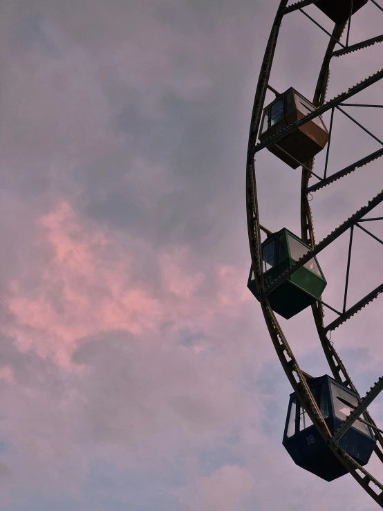 an amut wheel with four people sitting on top