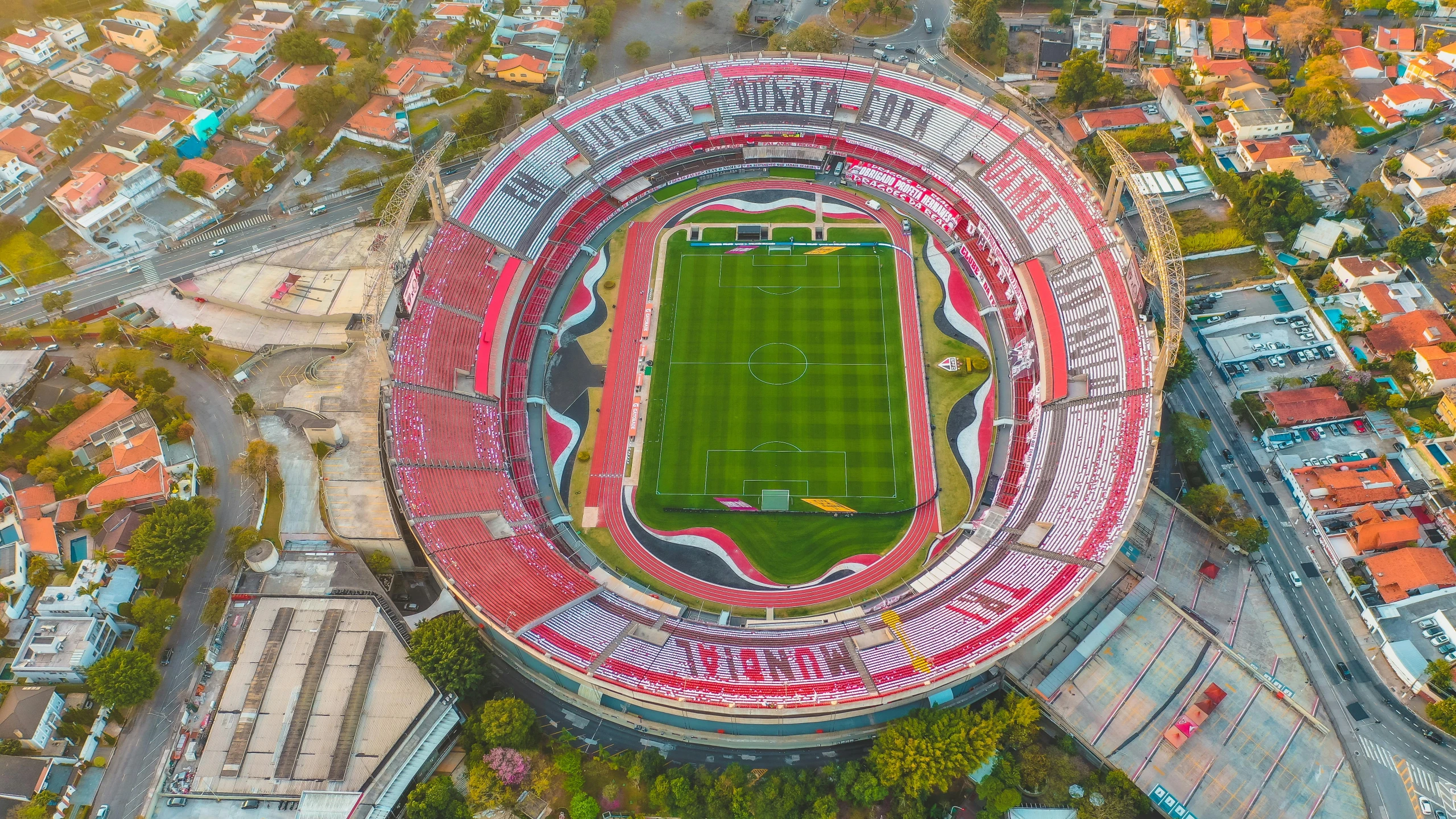 the soccer stadium has an overhead view of a green field