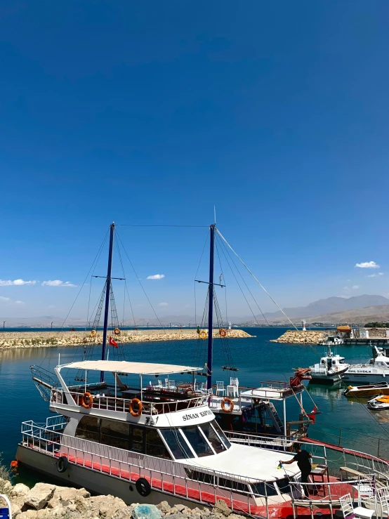 a group of boats are on the water