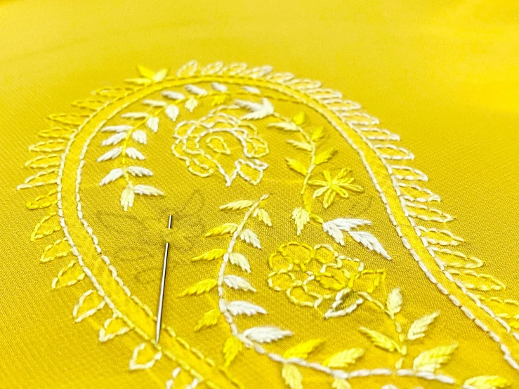 a close up s of a piece of yellow fabric