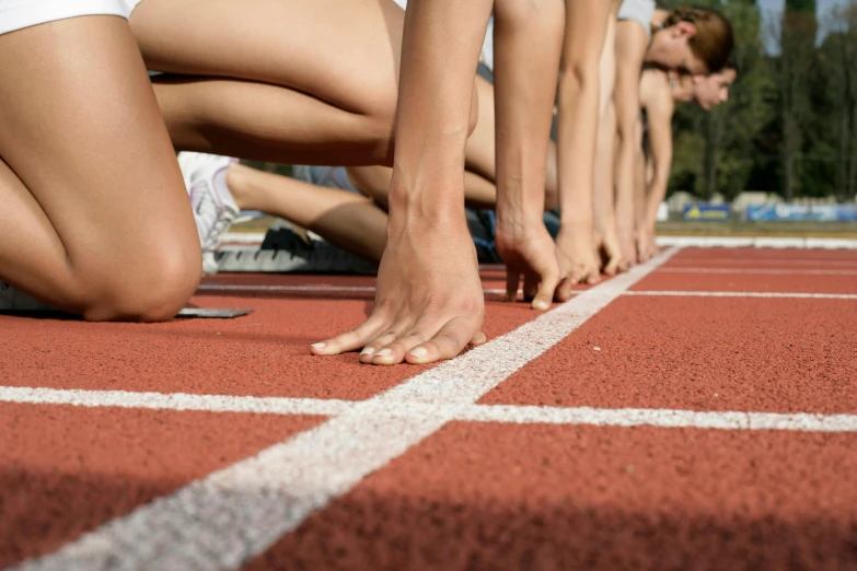 a close up of people standing on a track line