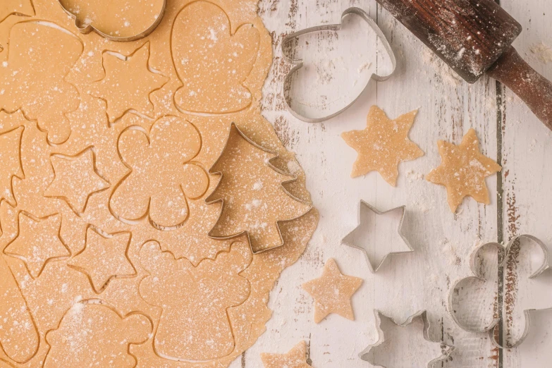 cookie shaped like hearts, stars and a tree