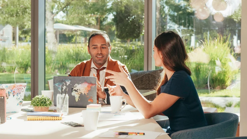 a couple having dinner at a table in a restaurant