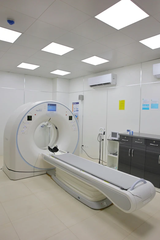 an mri room with equipment and lighting