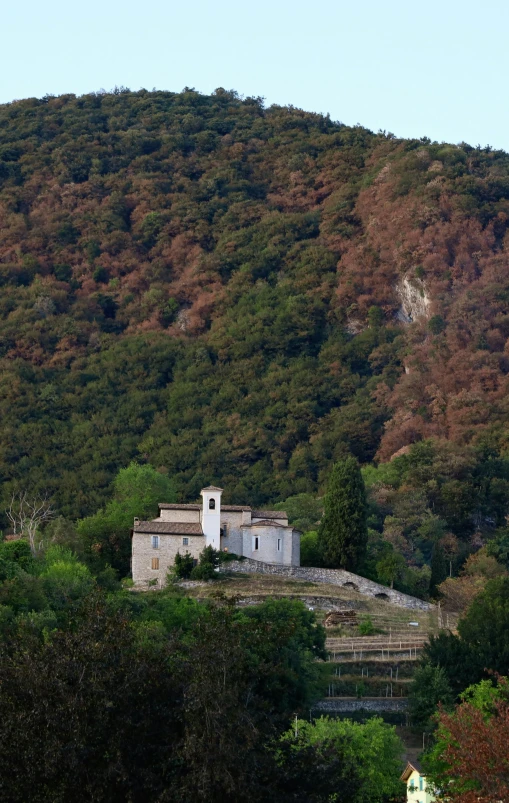 there is a very large building sitting on the hill