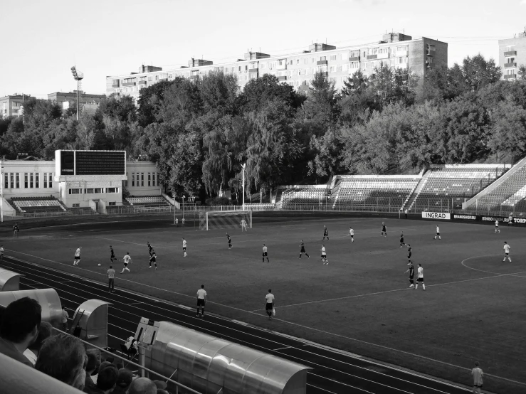 a soccer field with several players on it