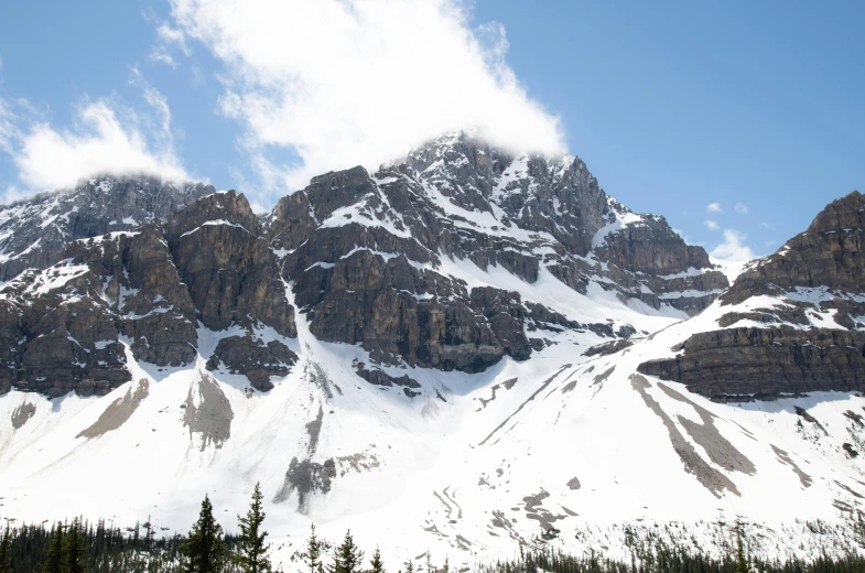 the snow covered mountains can be seen in this po