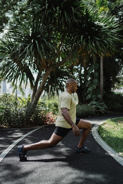 the man is running in the middle of a road