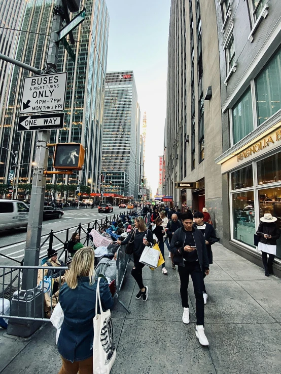 people walking in an urban area near buildings