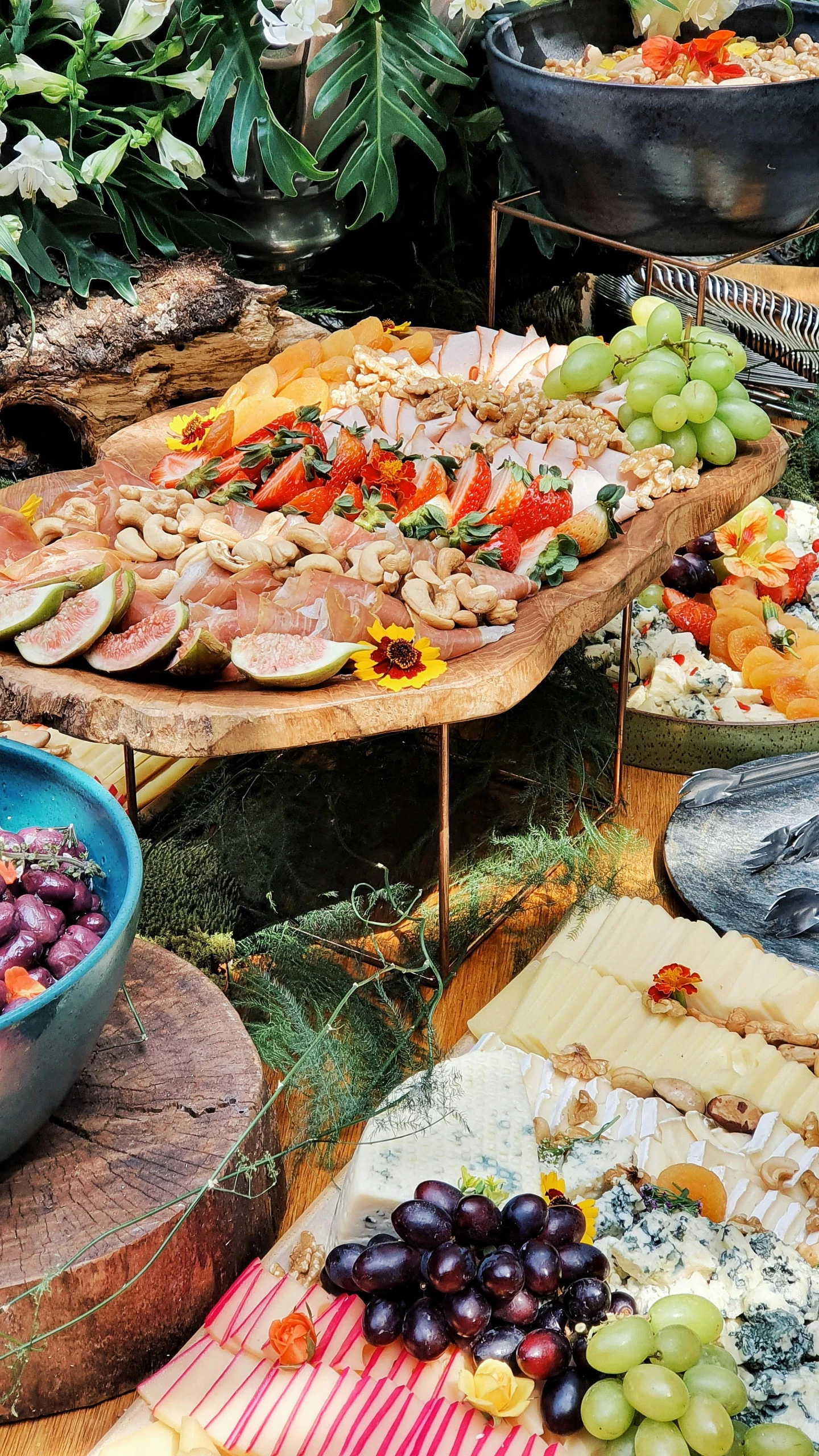 a table with plates and platters of food