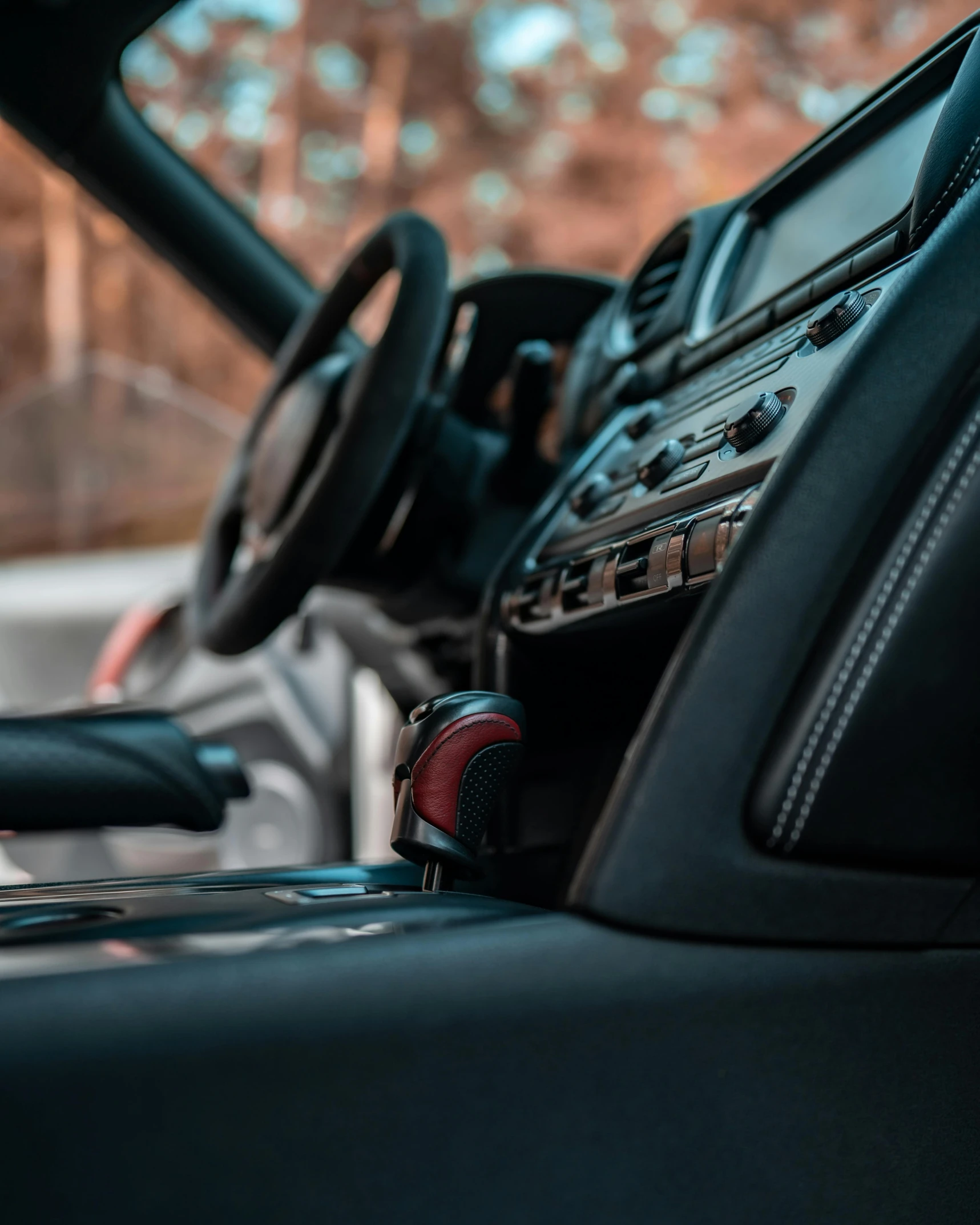 the dashboard of a car is shown with a blue phone