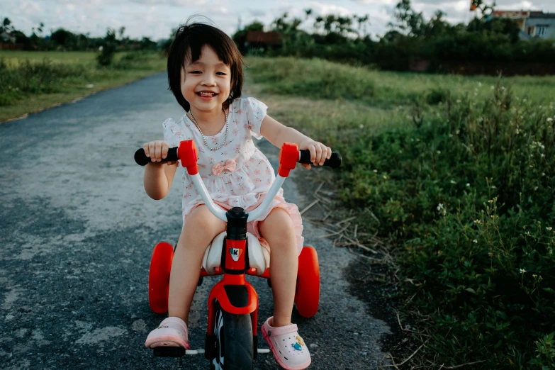  on bicycle in rural area near roadway