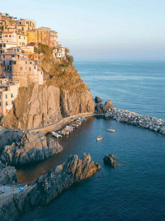 the view looking down at a town from a cliff