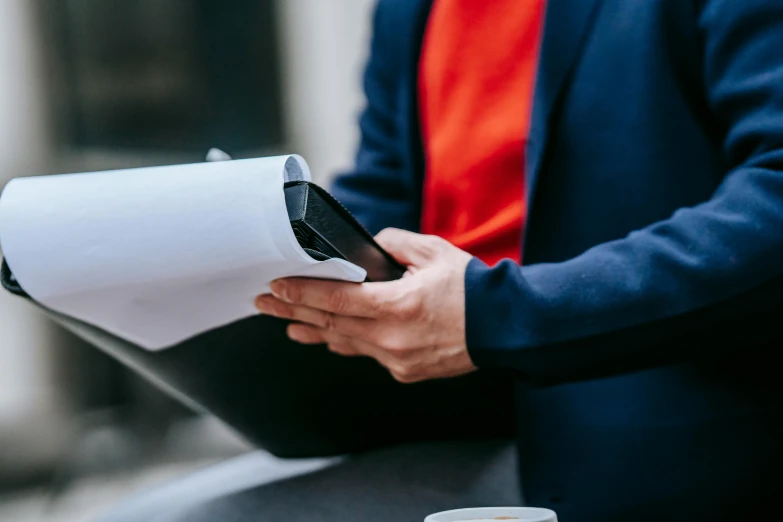 a person holding an iphone in their hand