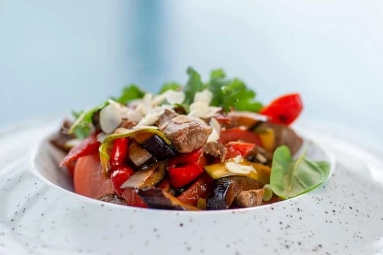 this is a very colorful salad in a bowl