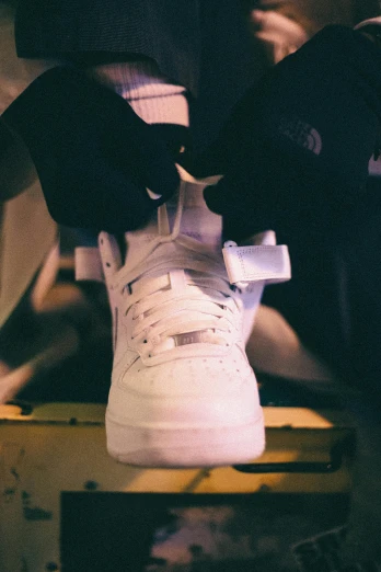 a pair of sneakers are sitting on a table