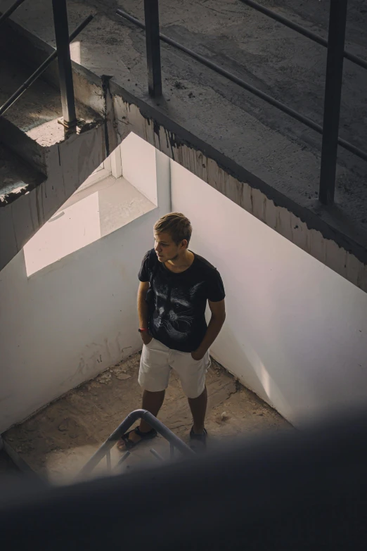 a man walking down a stairway of some kind