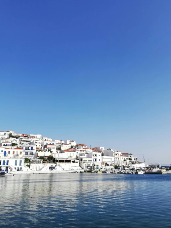 boats docked at the edge of a body of water