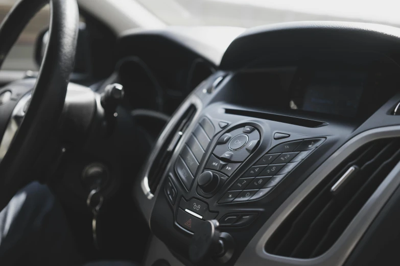 a closeup image of a car dashboard with the navigation system in view