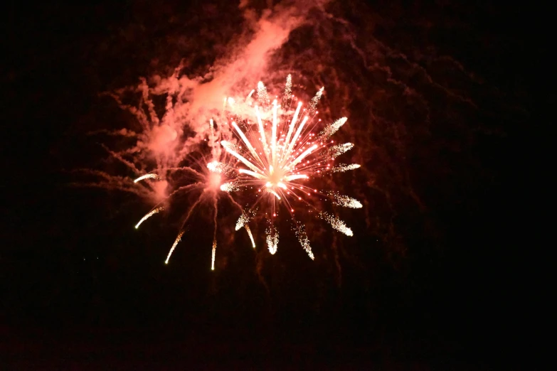 fireworks lit up the sky with red colors