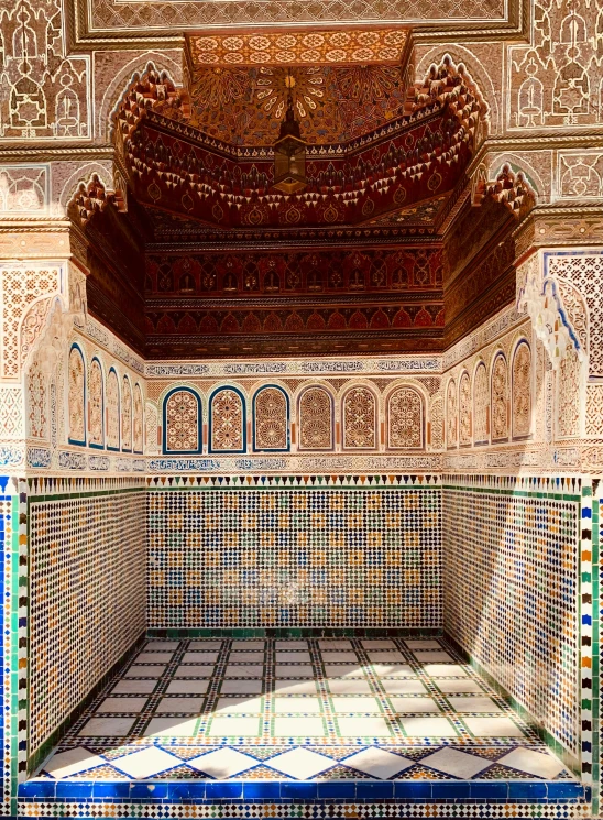 tiled room with a mirror and tile walls