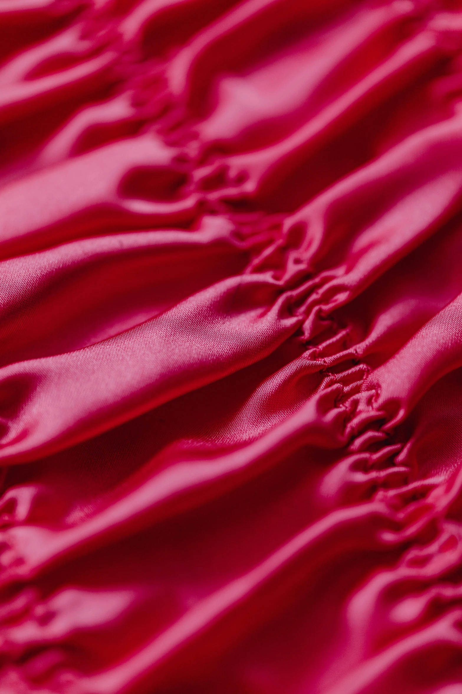 red fabric on a clothes bag, it appears to be very soft