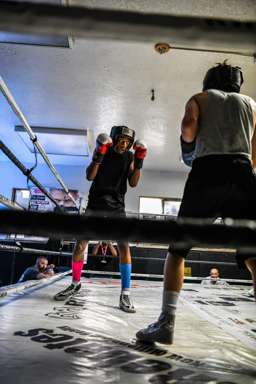 two boxers training in the ring for the next match