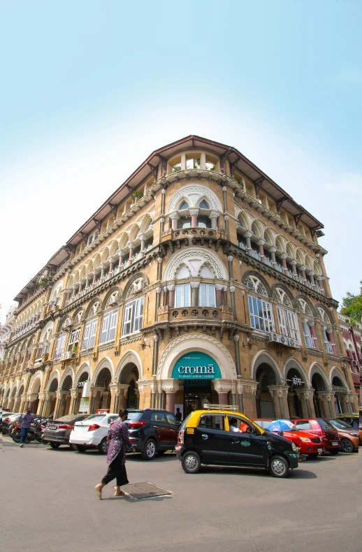 car parked in front of an old building