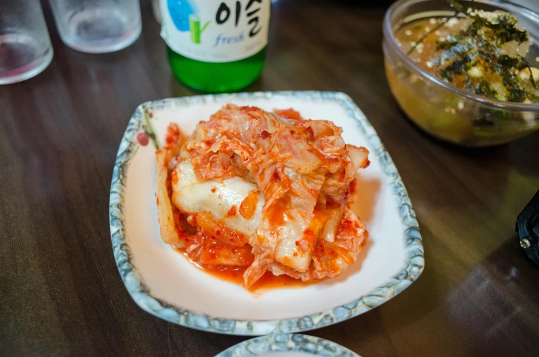 this is a pizza sitting on top of a plate