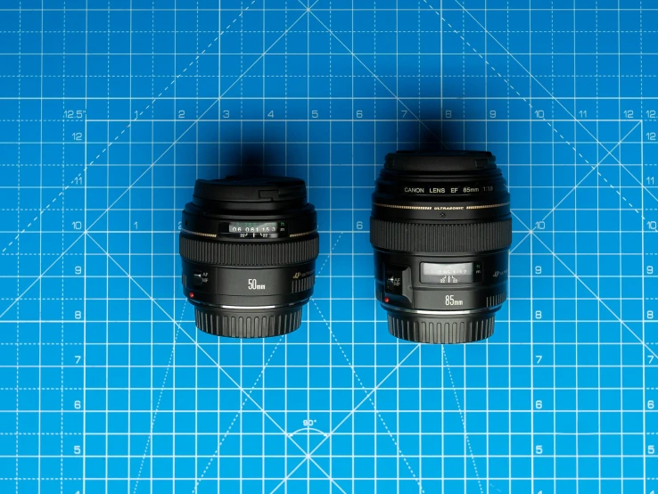 a pair of lens sitting on top of a  board