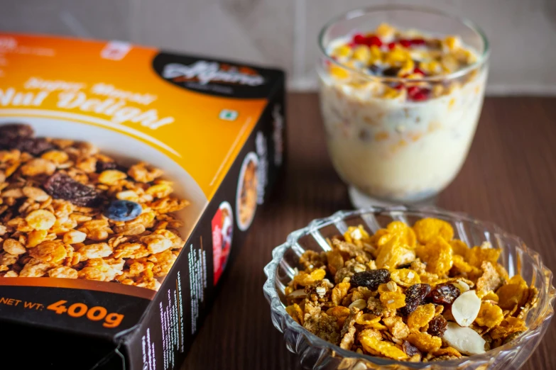 cereal in a glass bowl and a container next to it