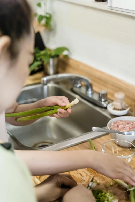 a person is cleaning a kitchen counter