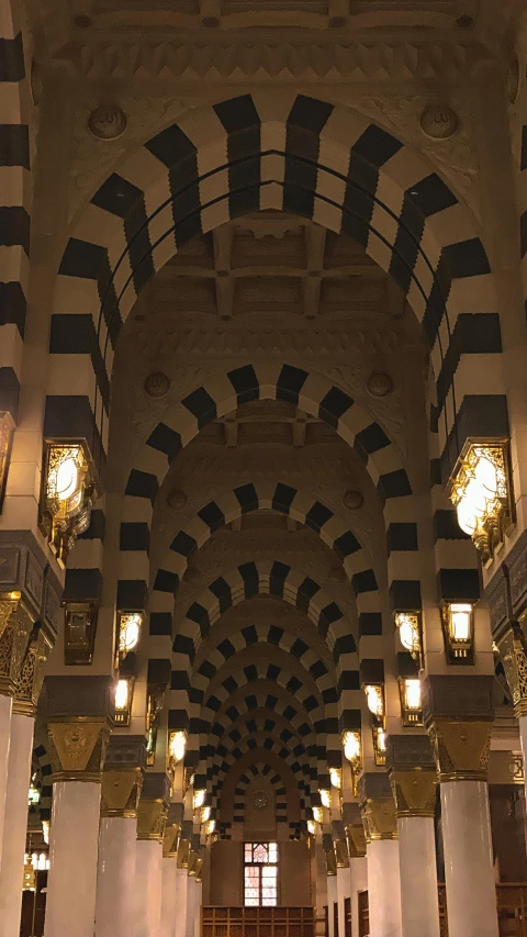 the interior of a el with many lit up columns