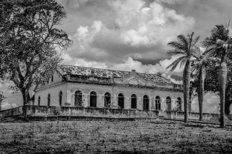 the old house is seen in this black and white po