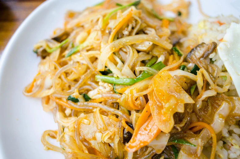 closeup of a chinese dish with vegetable and noodles