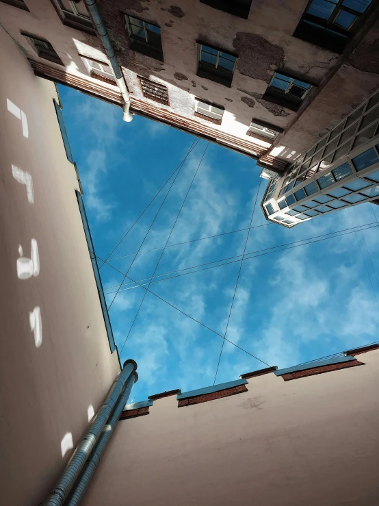 a street scene with a building and an overhead view