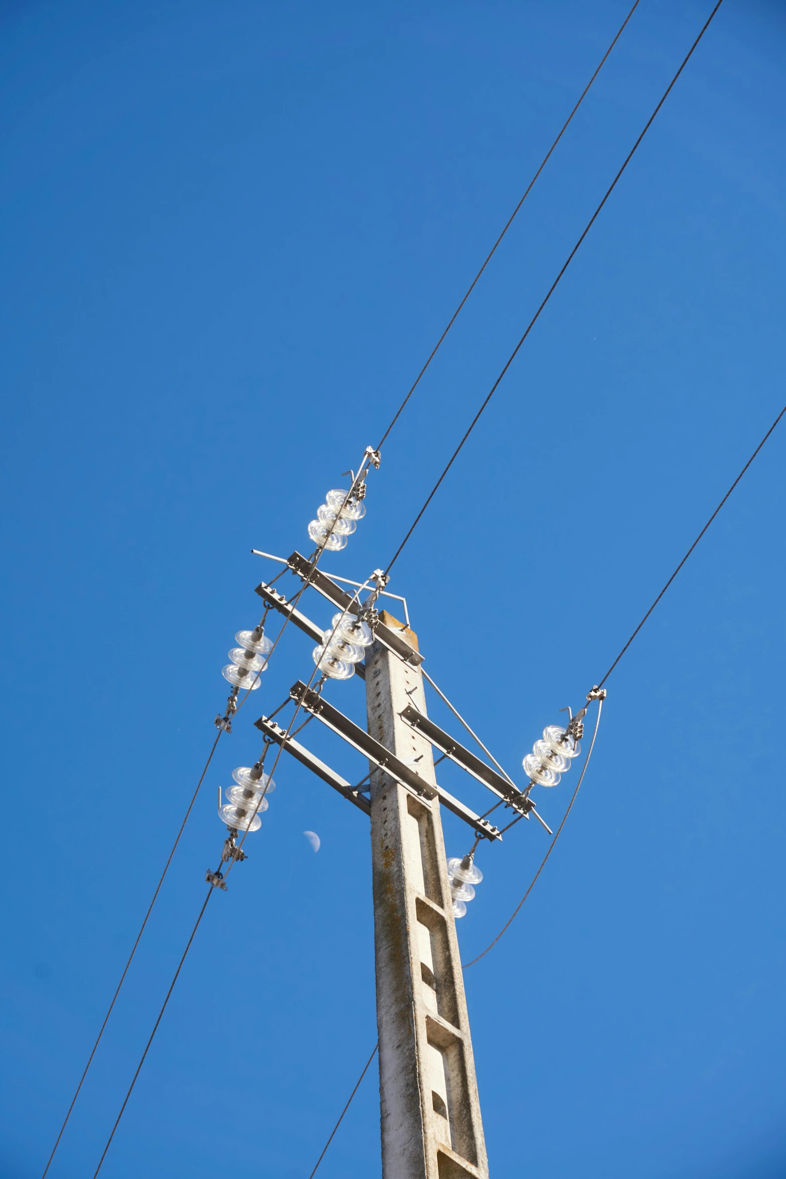 a telephone tower is on the side of the street