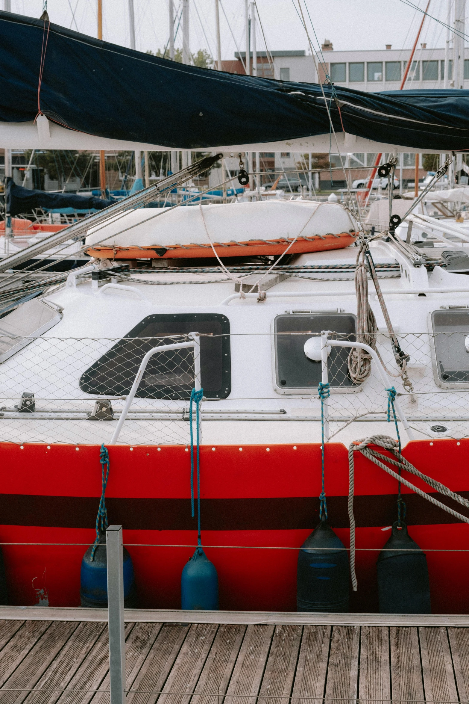 there are several boats docked on the water