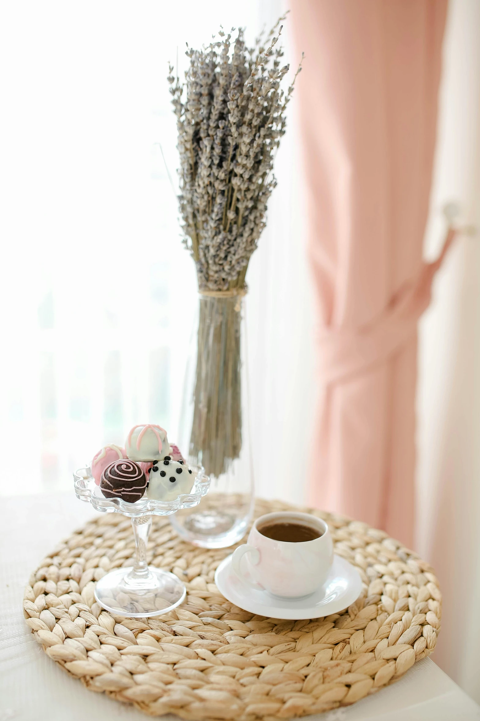 coffee and donuts are served in their glasses and on the table