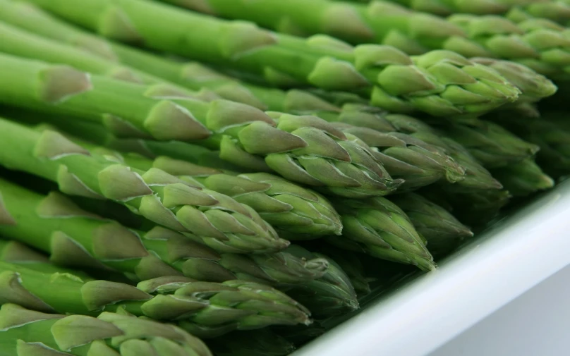 green asparagus are ready to eat on the table