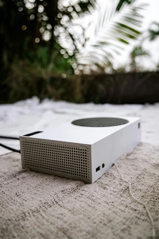 a portable speaker is sitting on the table