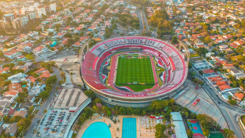 a soccer field sits empty in the sun