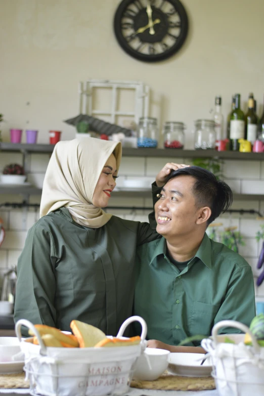 a young couple is making their way to a room with an abundance of goods