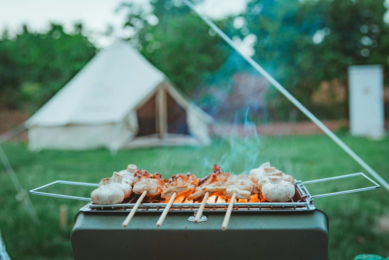 the grill is ready to be cooked outside for cooking