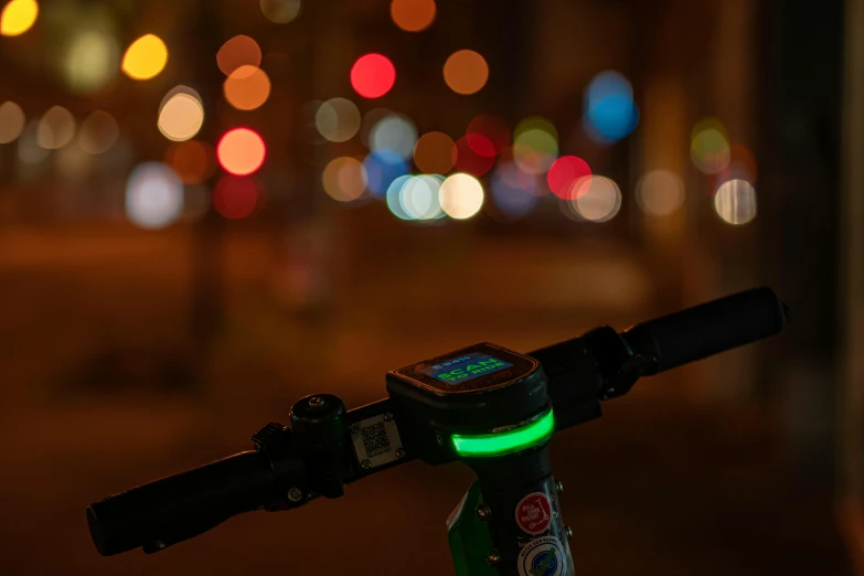 a view of a bike handlebars at night