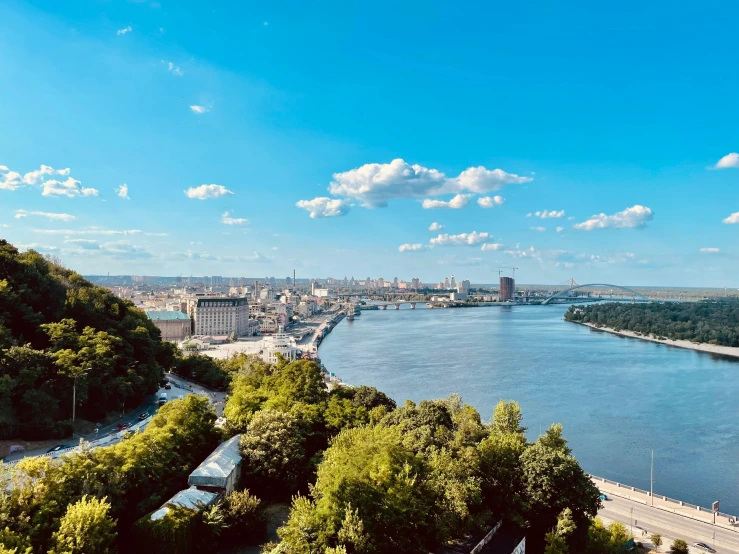 an aerial view of the river and a city