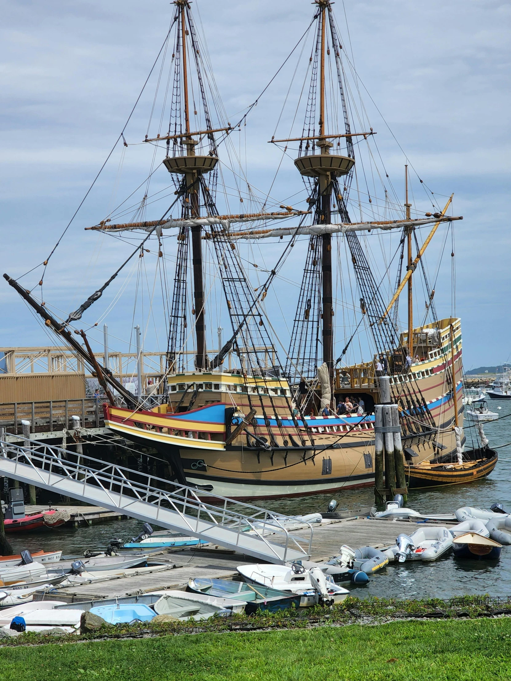 a docked pirate ship in the water at a marina